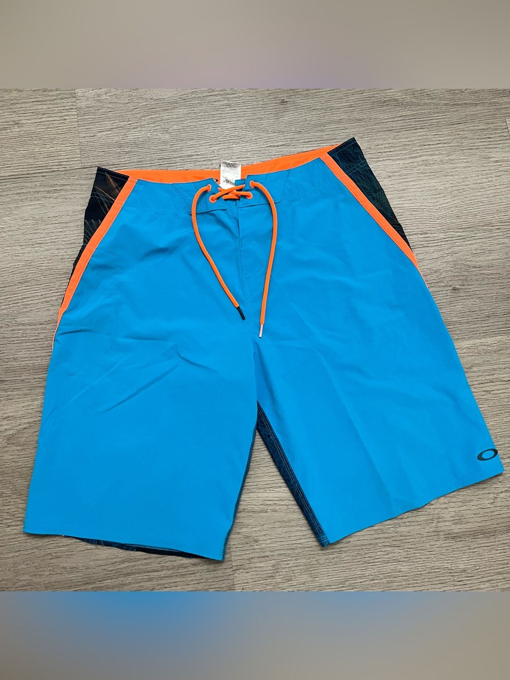 Oakley Bright Blue Board Shorts with Orange Accents